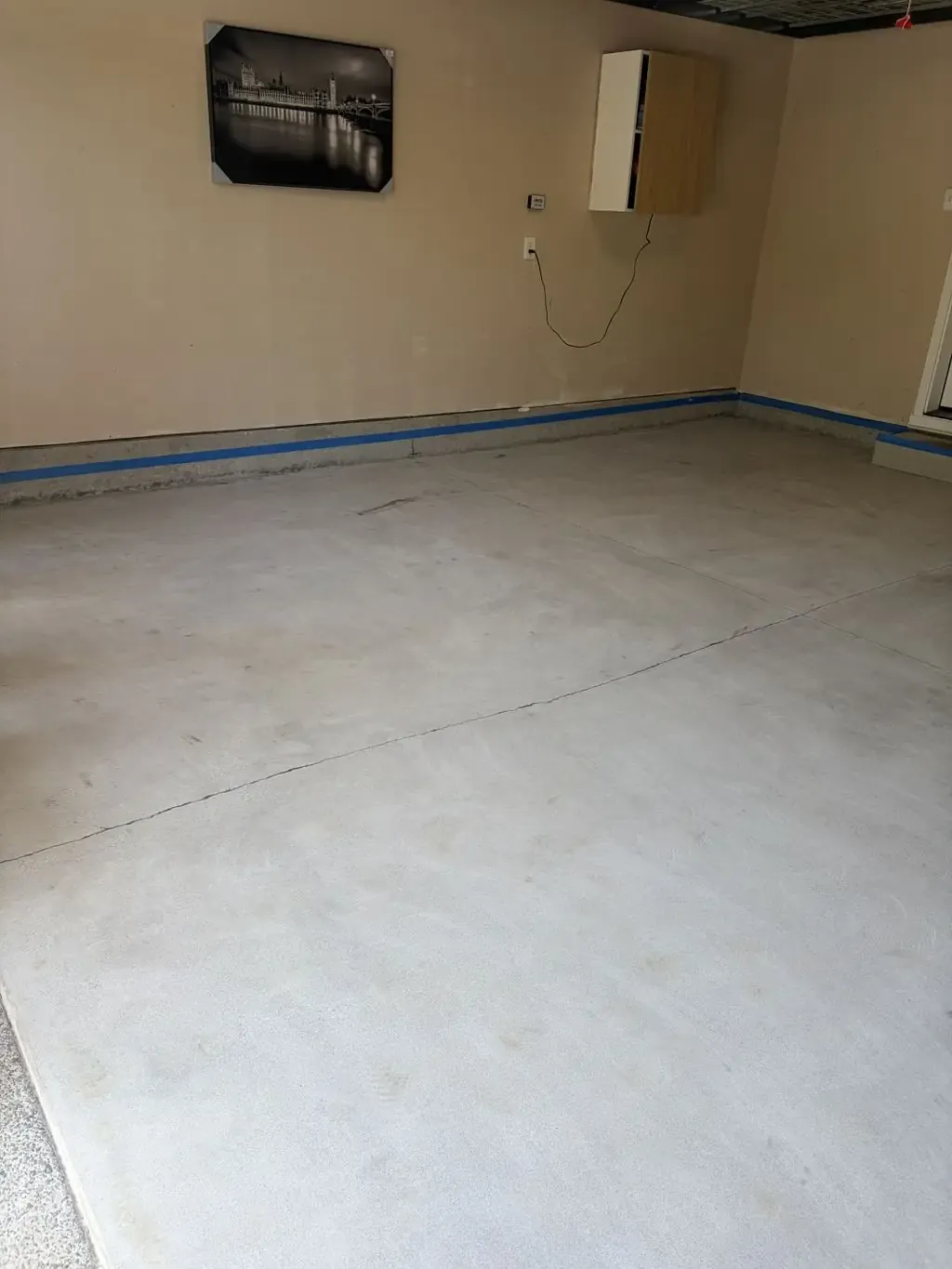 Garage floor with the base coat applied